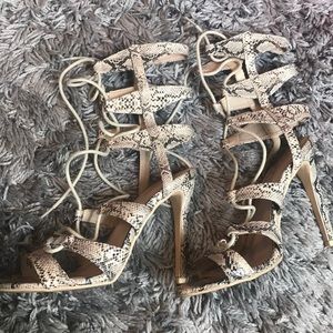 Snake print strap-up heels